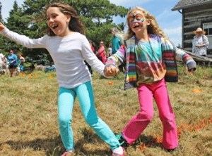 Smiles and squeals of laughter highlight the ever-popular three-legged race
