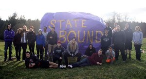 The Friday Harbor Wolverine girls and boys basketball team after painting 'the rock' off Beaverton Valley Rd.