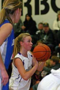 Point-guard Emily Guard lines up a free-throw attempt  in the Wolverines matchup at home
