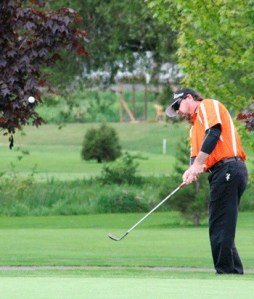 Friday Harbor's Ron Bates sends a chip shot toward the pin en route to a second-place finish at the Whidbey Golf Club's Men's Invitational