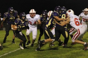 Senior quarterback Jess Hargrove runs down the field