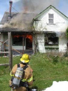 Town and island fire- fighters burned two  structures on False Bay Road as part of a joint live fire training exercise.