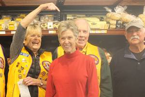 Shopping spree winners donate to food bank