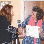 Addie Miller of San Juan Island receives first place in the 2016 Launch San Juan Islands business competition and $2,000 for her women&rsquo;s underwear company on San Juan Island called Tush & Bush.