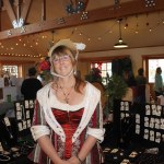 Staff photo/Hayley Day                                Cady Davies of Sea2Sky Creations sells her jewelry at Brickworks Old-Fashioned Christmas Market.
