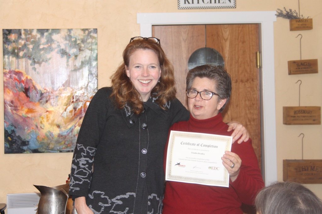 Claudia Bradley of Lopez Island receives third place in the 2016 Launch San Juan Islands business competition and $500 for her for a sewing and repair company called Sew What!.