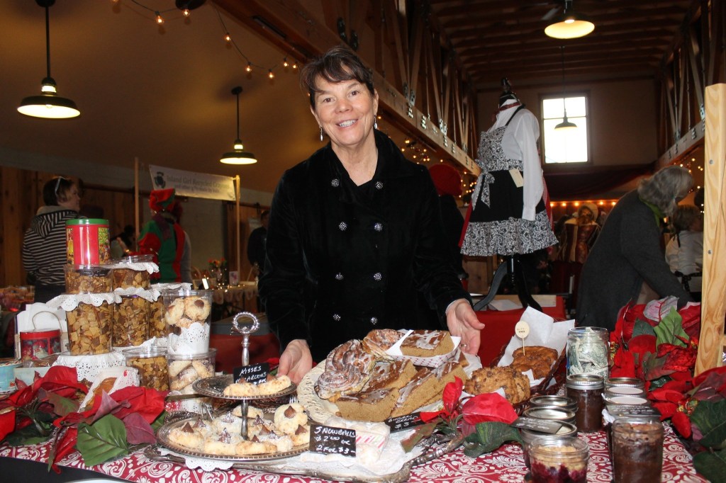 Staff photo/Hayley Day                                Cynthia Burke of Cynthia&rsquo;s Bistro sells sweets at Brickworks Old-Fashioned Christmas Market.