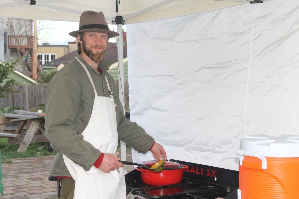 Staff photo/Hayley Day                                Blake Johnston, of Hellen&rsquo;s Farm on Lopez Island, makes soup at Brickworks Old-Fashioned Christmas Market.