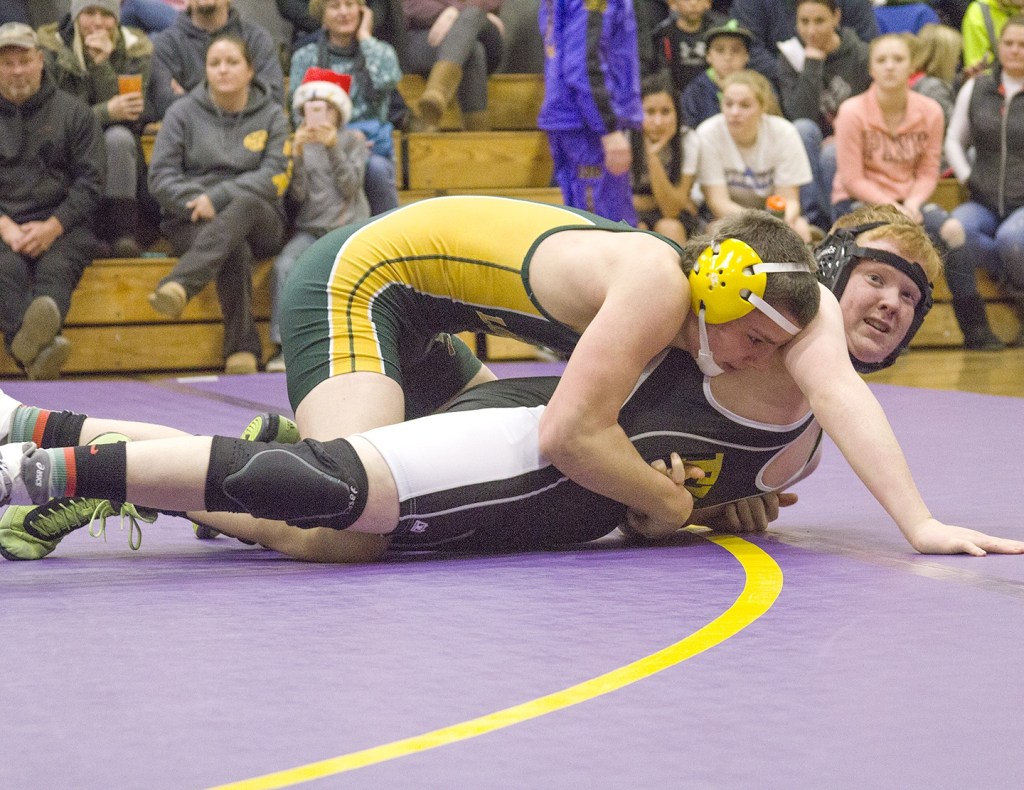 Staff photo/Greg Sellentin                                Isaac Brumsickle fights from the bottom position