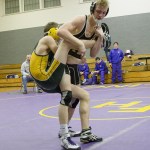 Staff photo/Greg Sellentin                                Senior James Guard works the single leg takedown.
