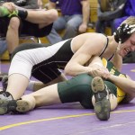 Staff photo/Greg Sellentin                                James Guard sets up and puts in a deep double arm bar.