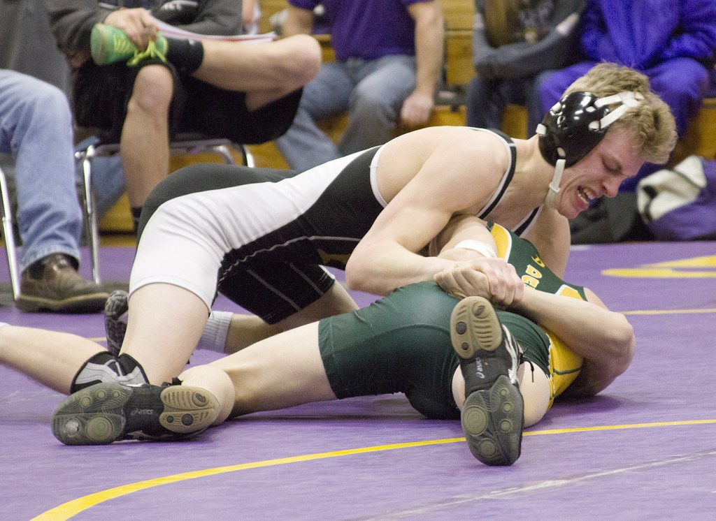 Staff photo/Greg Sellentin                                James Guard sets up and puts in a deep double arm bar.