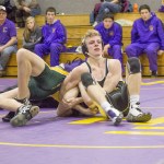 Staff photo/Greg Sellentin                                James Guard sets up and puts in a deep double arm bar.