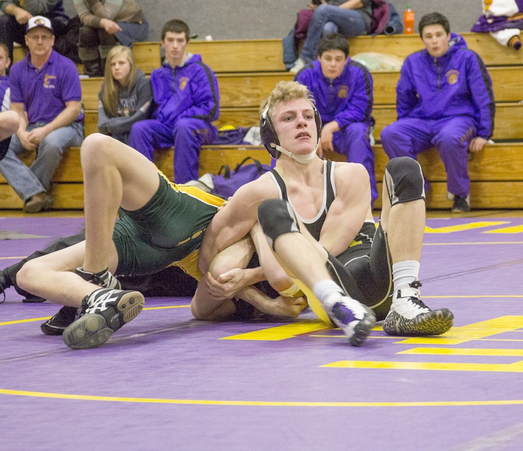 Staff photo/Greg Sellentin                                James Guard sets up and puts in a deep double arm bar.