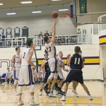 Staff photo/Greg Sellentin                                John Gustafson sinks an inside jump shot.