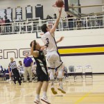 Staff photo/Greg Sellentin                                Senior Eli Cooper-West scoring on a breakaway layup.