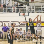 Staff photo/Greg Sellentin                                Senior Joe Stewart sinks a 2 point jump jump shot.