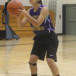 Senior Kianna Woods prepares for a shot.