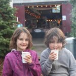 Staff photo/Hayley Day                                Kids sip hot chocolate at Brickworks Old-Fashioned Christmas Market.