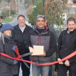 Staff photo/Hayley Day                                Town officials and an engineer from the grant provider commemorate the completion of phase one on the Tucker Avenue project with a ribbon cutting ceremony on Dec. 8.