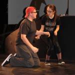 Staff photo/Heather Spaulding                                The Lion, Eric Sabel, meets with Dorothy, Jillian Urbach.
