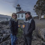 Staff photo/Greg Sellentin                                Attendees Michelline Halliday and Ben Bama hold tea lights in honor of the Salish Sea&rsquo;s orcas who passed in 2016.