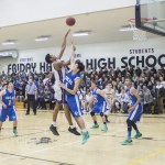 Staff photo/Greg Sellentin                                Simon Vincent goes for an inside jump shot.