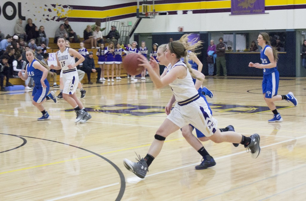 Staff photo/Greg Sellentin                                Savannah Hoffman brings the ball down the court.
