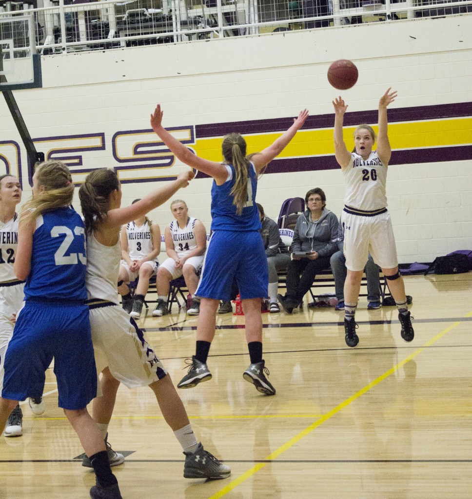 Staff photo/Greg Sellentin                                Hannah Hopkins shoots from the outside.