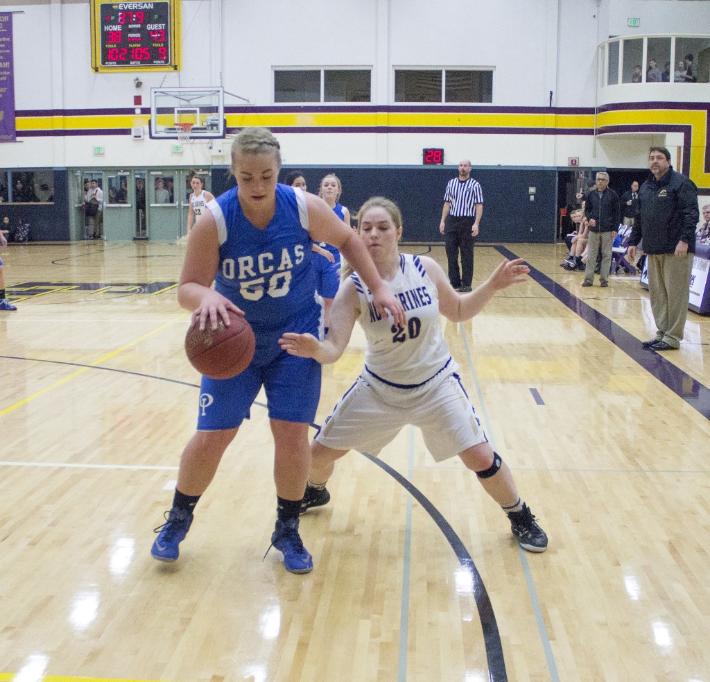 Staff photo/Greg Sellentin                                Hannah Hopkins plays strong defense.