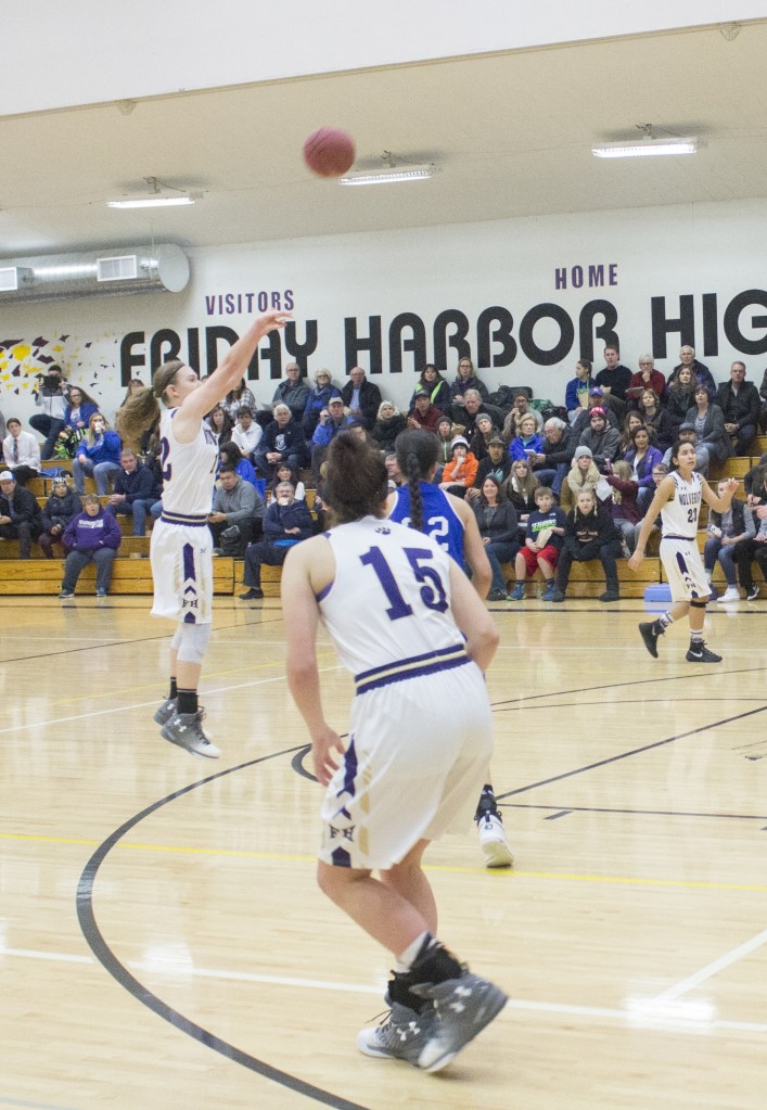 Staff photo/Greg Sellentin                                Junior Ciera Bailey scores with jump shot from close to the three-point line.