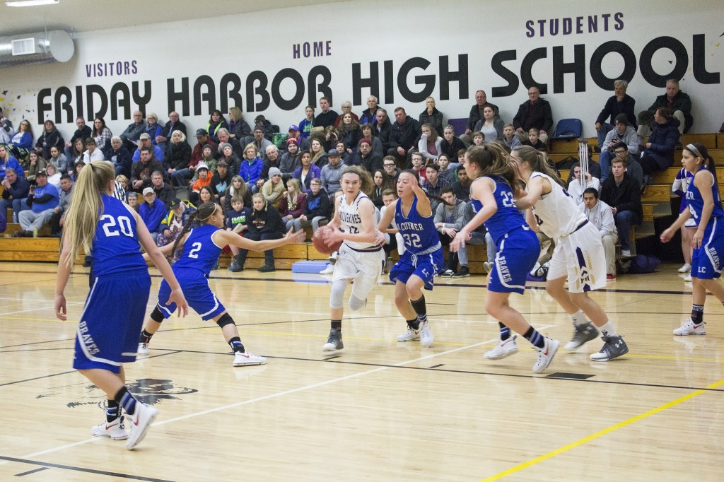 Staff photo/Greg Sellentin                                Junior Ciera Bailey moves through strong defense.