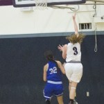 Staff photo/Greg Sellentin                                Junior Savannah Hoffman scores on a breakaway layup.