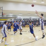 Staff photo/Greg Sellentin                                Senior Jake Lowe attempts a three-point shot.