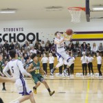 Staff photo/Greg Sellentin                                Jake Lowe scores on a breakaway layup in the first quarter.