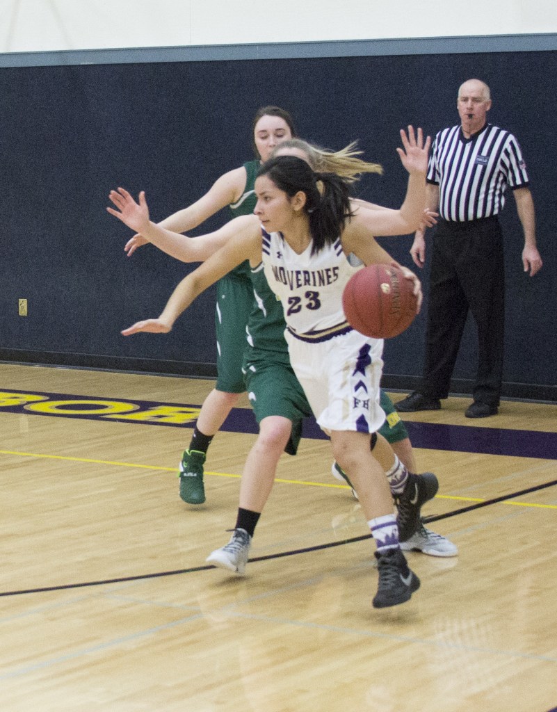 Staff photo/Greg Sellentin Alexa Mora looks for an open shot from outside the 3 point line