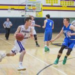 Staff photo/Greg Sellentin                                Eli Cooper-West drives to the basket during the first quarter.
