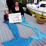 Contributed photo                                Lopez protesters pose with their sign.