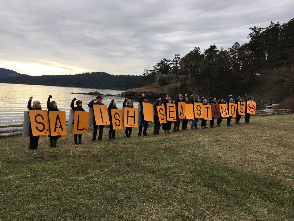 Contributed photo                                Protesters on Orcas Island stand against Kinder Morgan.
