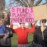 Staff photo/Hayley Day                                A handful of islanders gathered outside the Feb. 22 SJCPHD No. 1 meeting to protest for and against funding Planned Parenthood with taxpayer money.