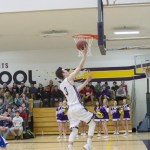 Staff photo/Greg Sellentin                                Senior Eli Cooper-West scores.