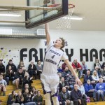 Staff photo/Greg Sellentin                                Junior Isaac Mayer scores.