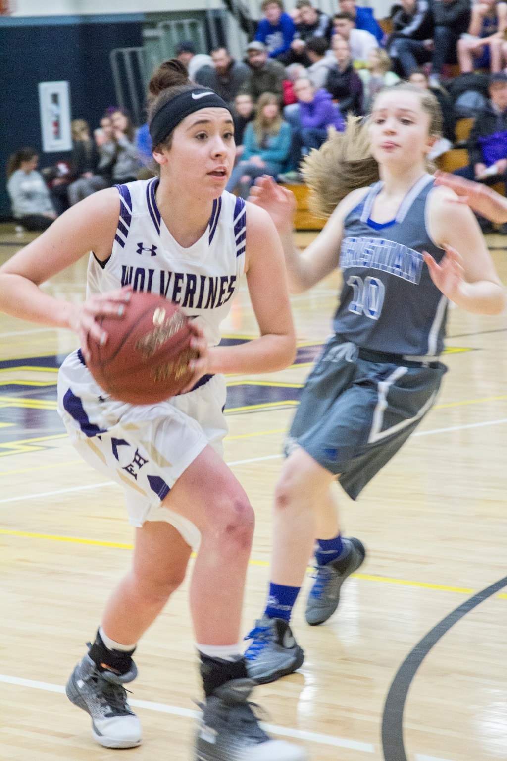 Staff photo/Greg Sellentin                                Junior Kiana Woods moves the ball down court.