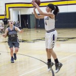 Staff photo/Greg Sellentin                                Sophomore Ava Hoffman shoots a three-point shot.