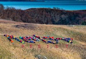Islanders spell ‘resist’ in protest
