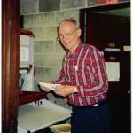 Contributed by Rae Kozloff. Eugene Kozloff in his darkroom.