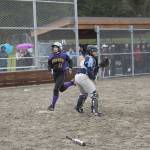 Staff photo/Greg Sellentin                                Hannah Hopkins scores in the second inning.