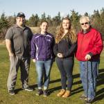 Staff photo/Greg Sellentin                                Two of the three girls on the team, Hallie Hargrove, and Anna Romeo.
