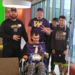 Contributed photo                                University of Washington football players visit Friday Harbor High School sophomore Quincy Vague in the hospital. Vague was diagnosed with an inoperable brain tumor last February.