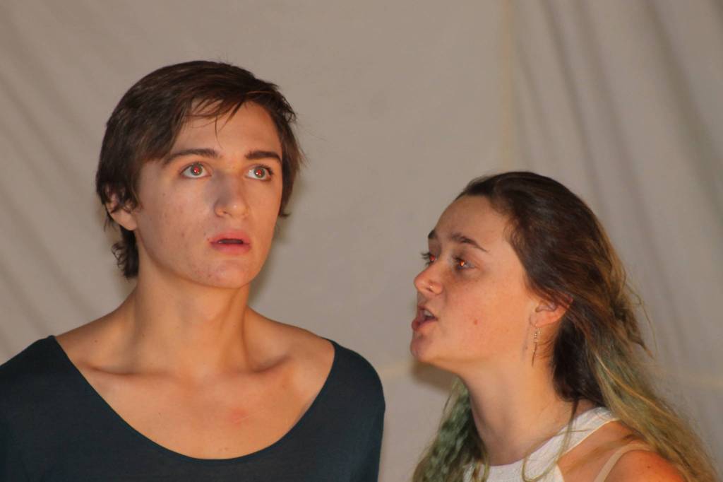 Staff Photos/Heather Spaulding                                Clockwise from top left: The goddess Naja gives Anon advice, Blind man invites Anon to his home for dinner, Ula Stutz as a refugee, Refugee helps Anon along his journey while the goddess Naja watches